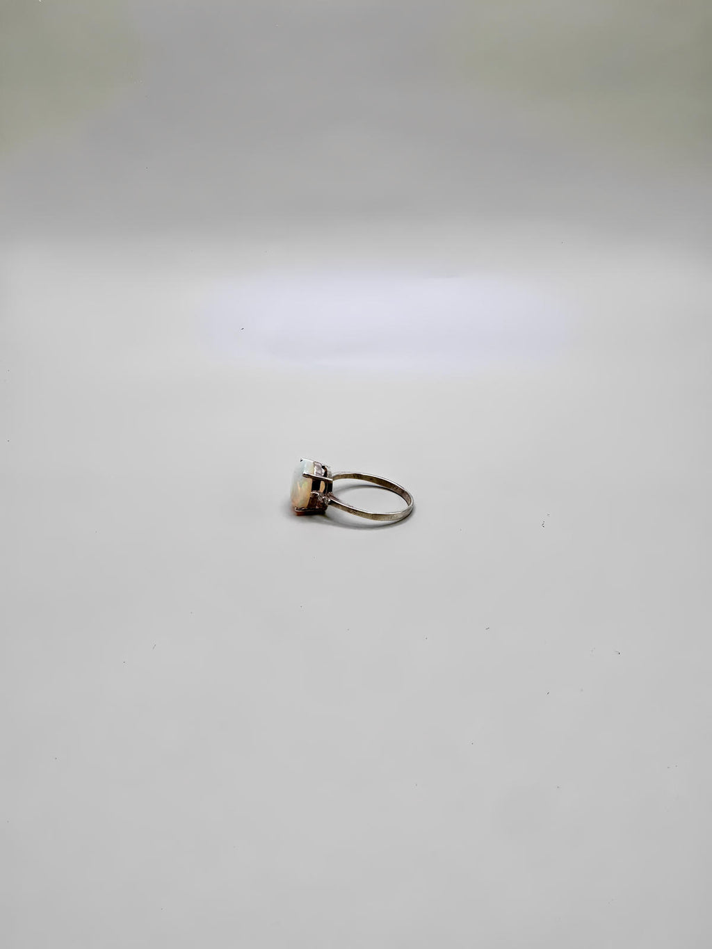 FIRE OPAL PEAR CUT AND DIAMONDS RING