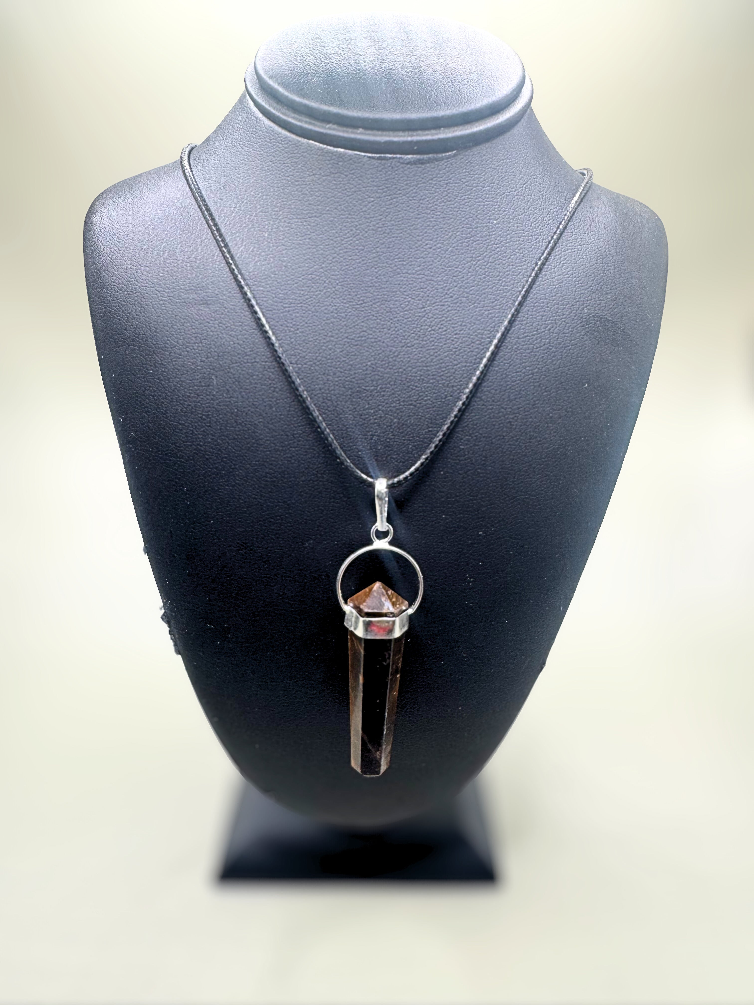 Tigers eye pendulum necklace.