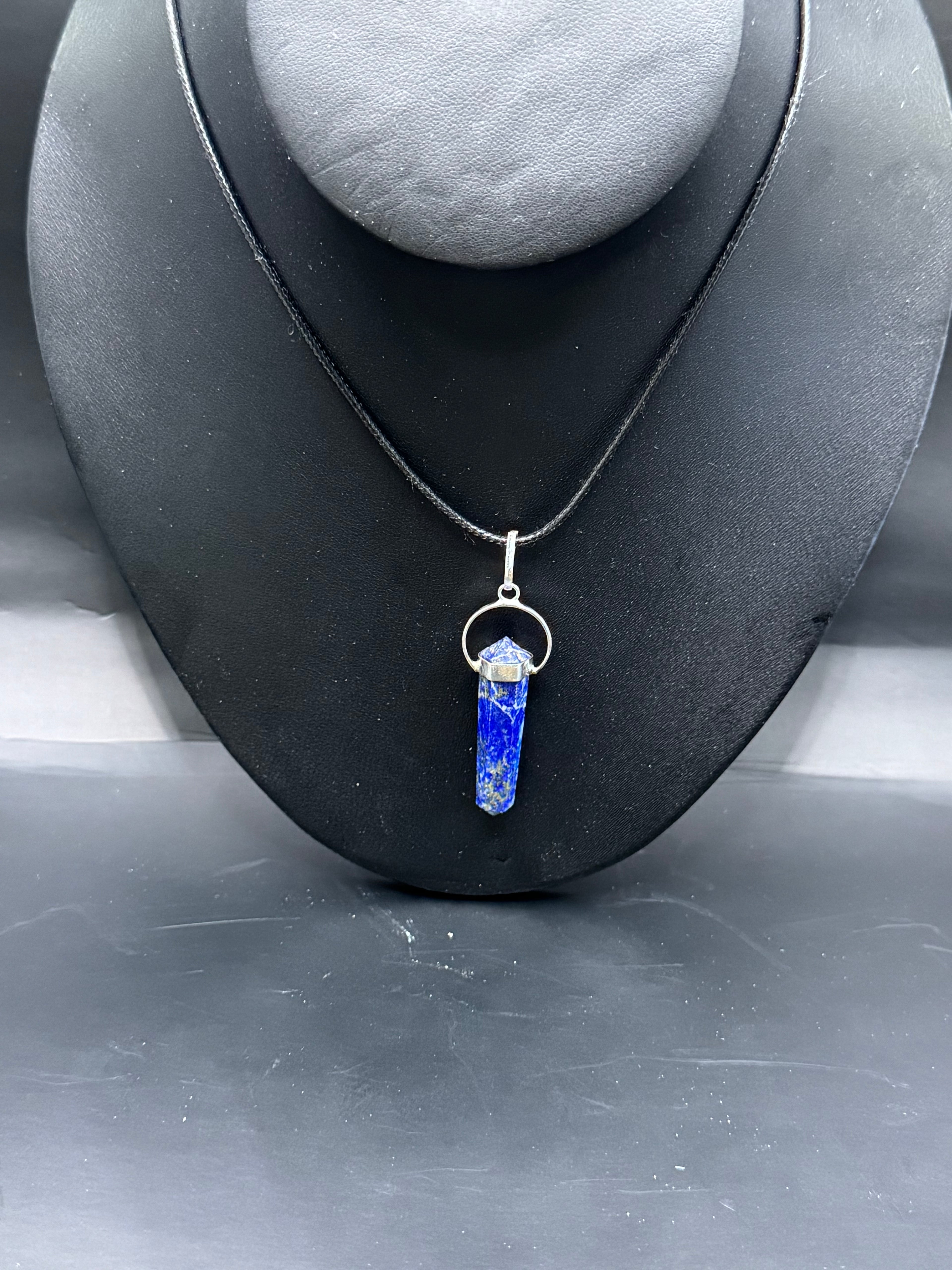 Sodality pendulum necklace.