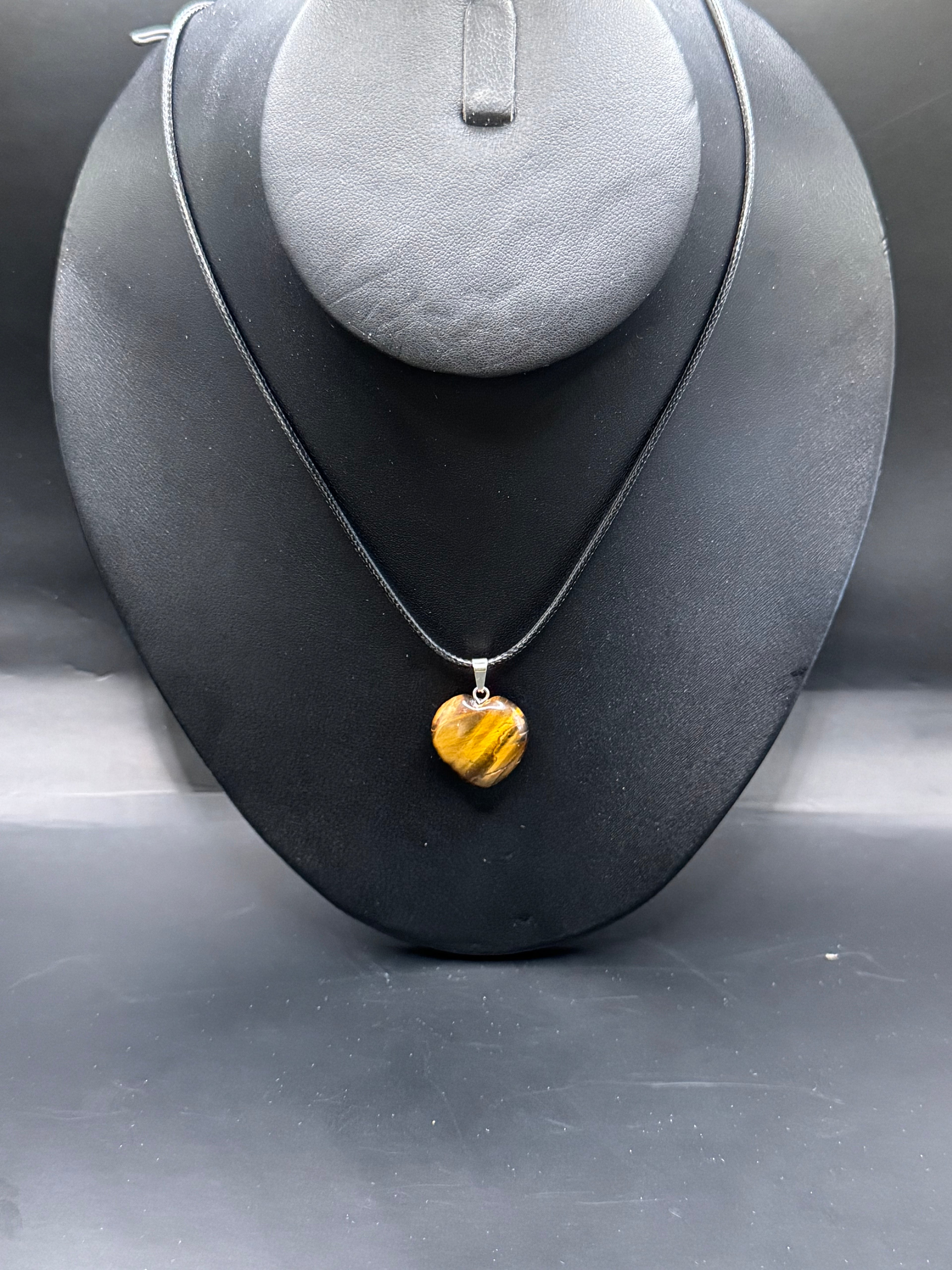 Tigers eye heart necklace.